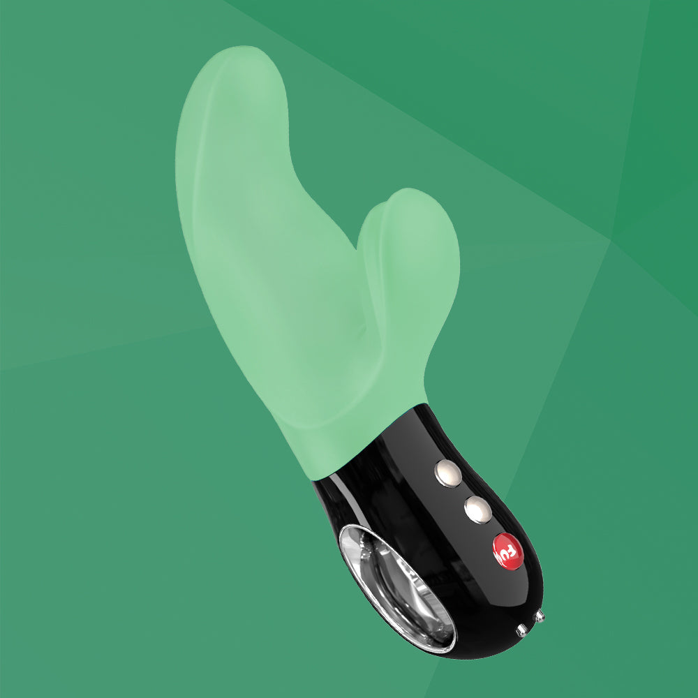 A jade and black dual stimulation vibrator with two motors and a flexible arm.