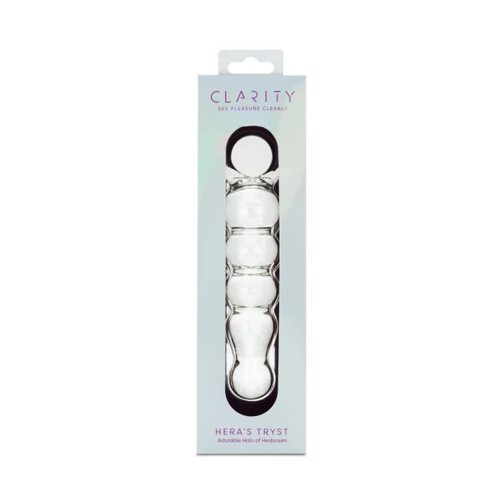 A clear glass dildo with a curved shape and a circular handle, in its packaging.