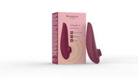 Womanizer Classic 2 clitoral stimulator in bordeaux, featuring Pleasure Air Technology and 10 intensity levels.