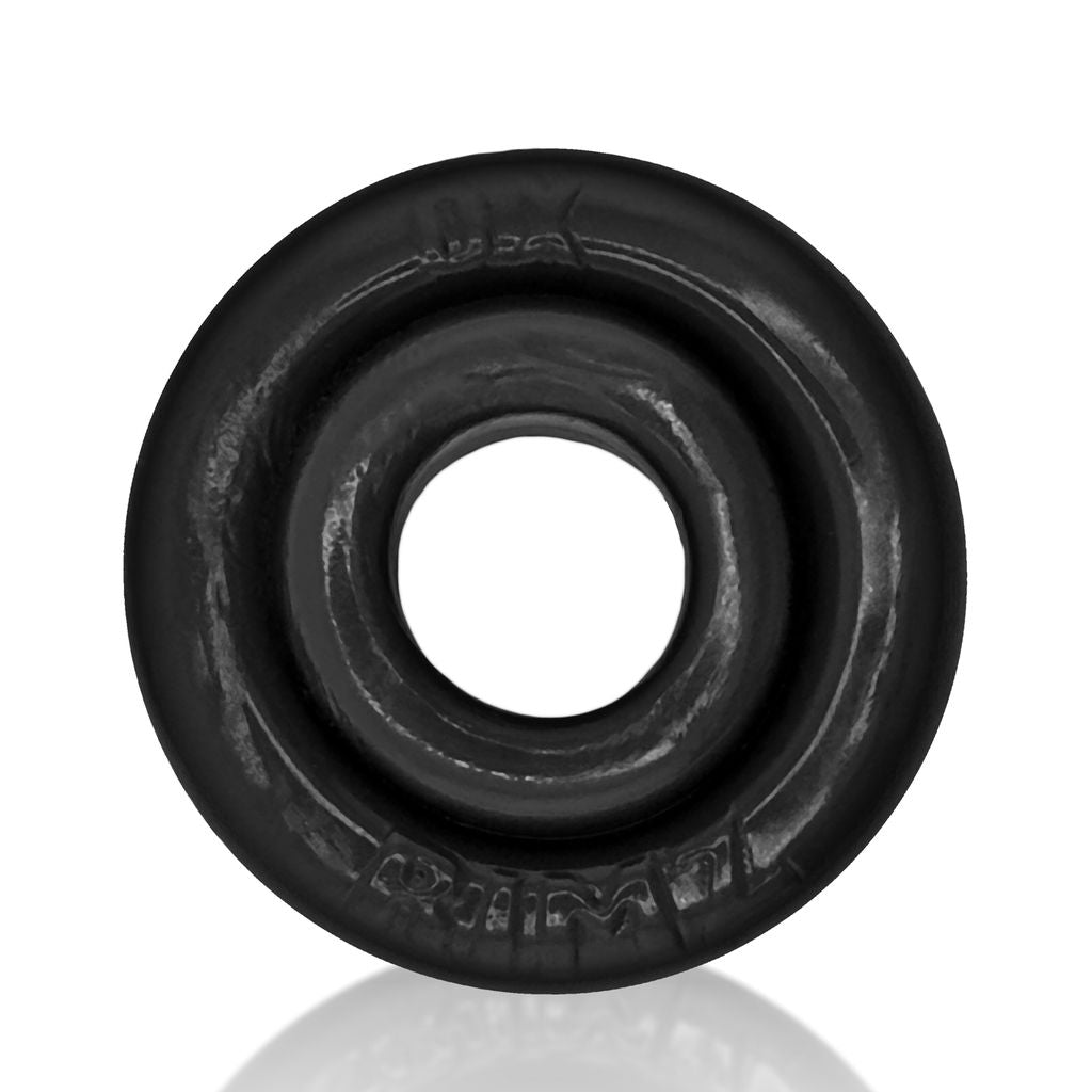 Black soft rubber cock ring with textured outer surface.