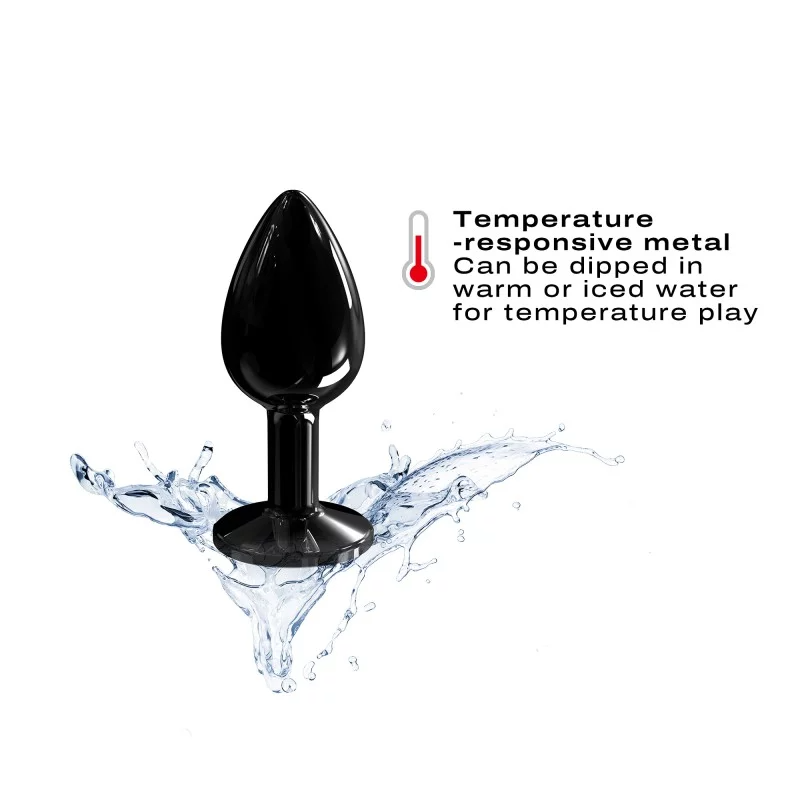 Black metal anal plug with a jewel base, shown with water splashes.