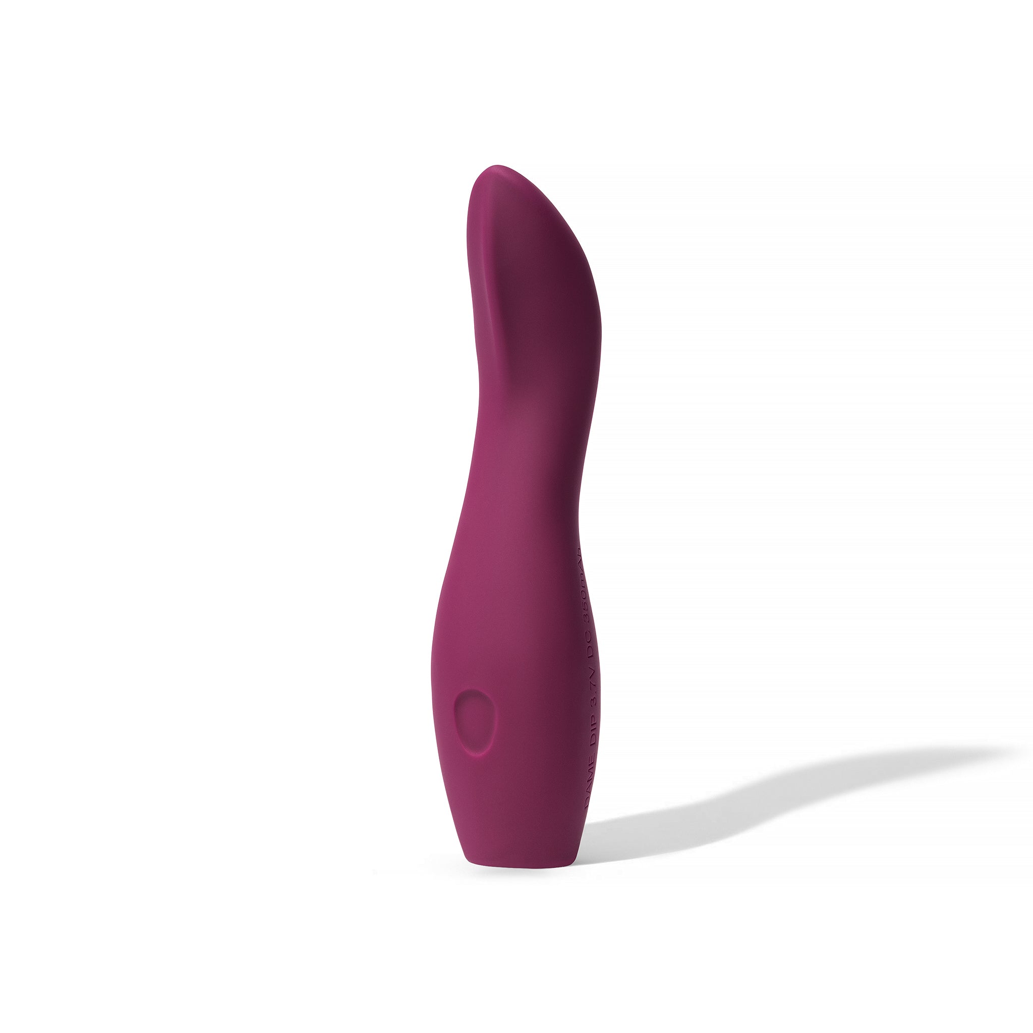 A plum-colored silicone vibrator with a curved shape and a power button.