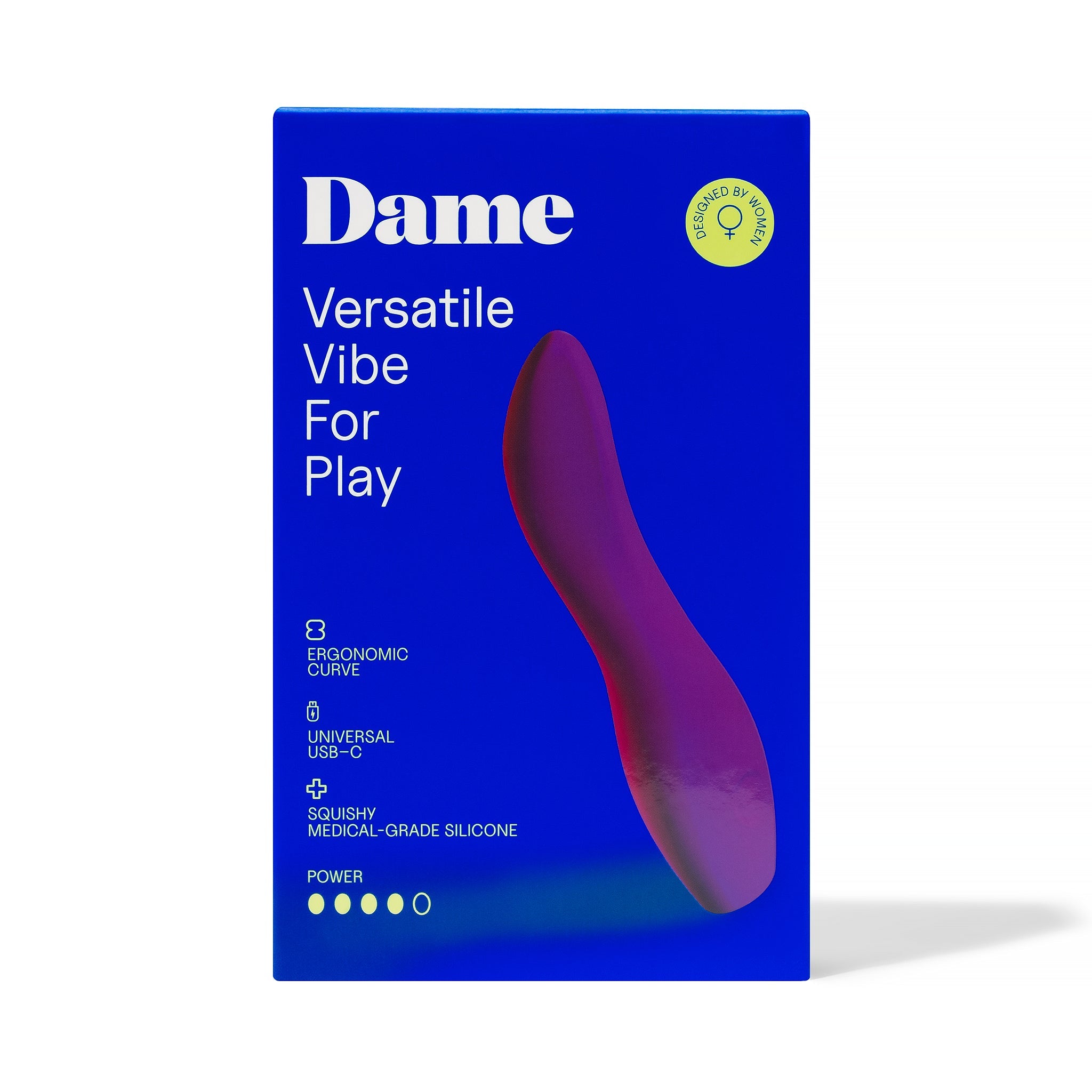 A plum-colored Dame Dip 2.0 vibrator on a blue box with product details.