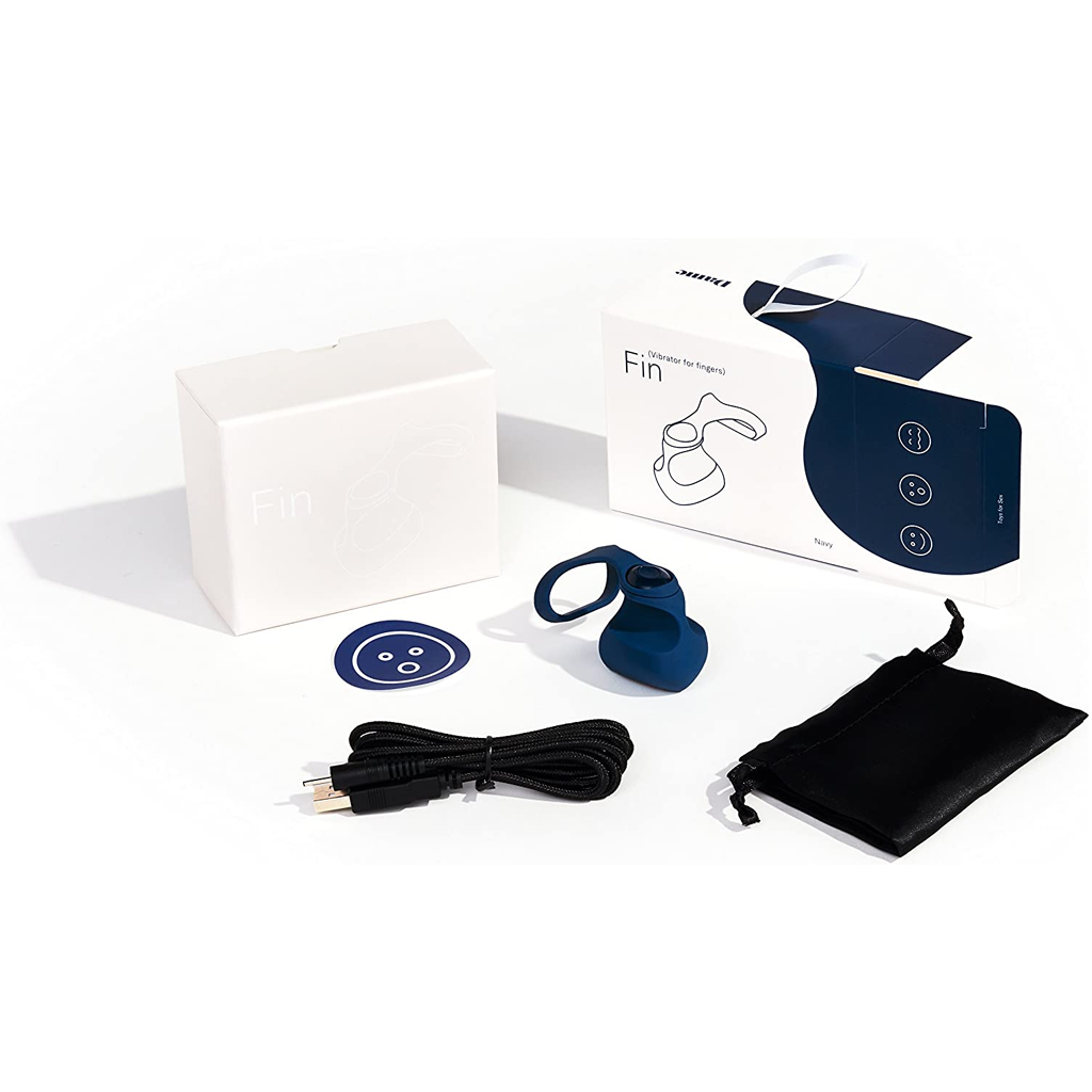 Navy Fin finger vibrator with charging cable, storage bag, and packaging.