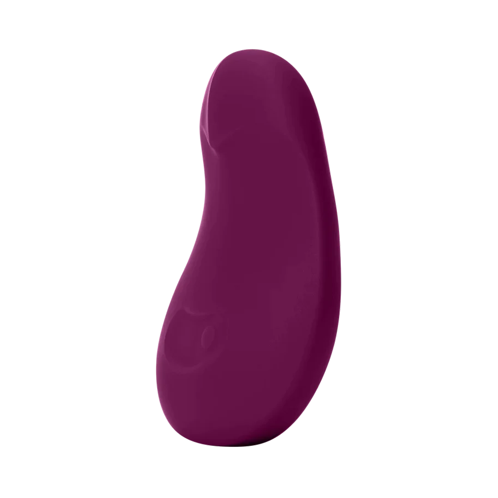 A plum-colored flexible silicone vibrator with a curved shape.