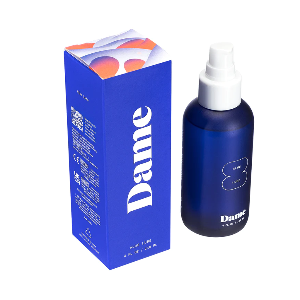 A blue bottle of Dame Aloe Lube sits next to its matching blue box.