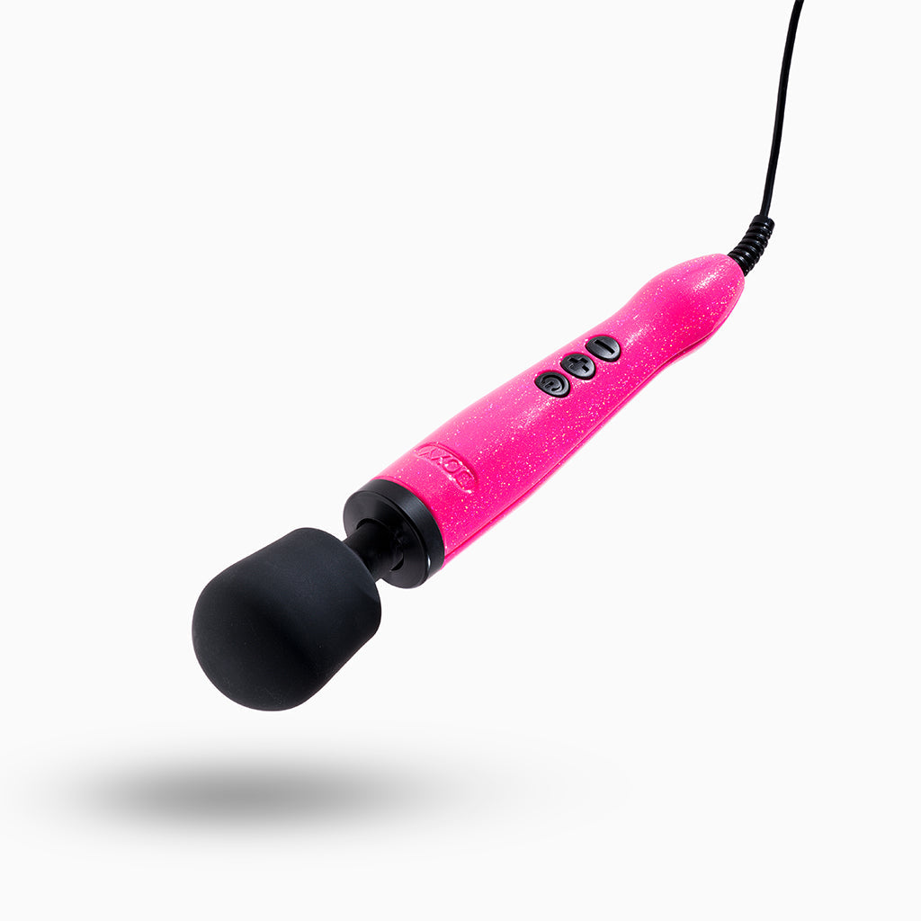 Hot pink Doxy wand massager with black head and cord.