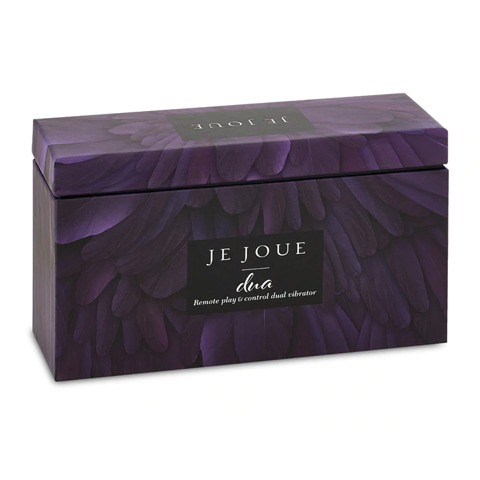 A purple box with a feather pattern and the Je Joue Dua logo.