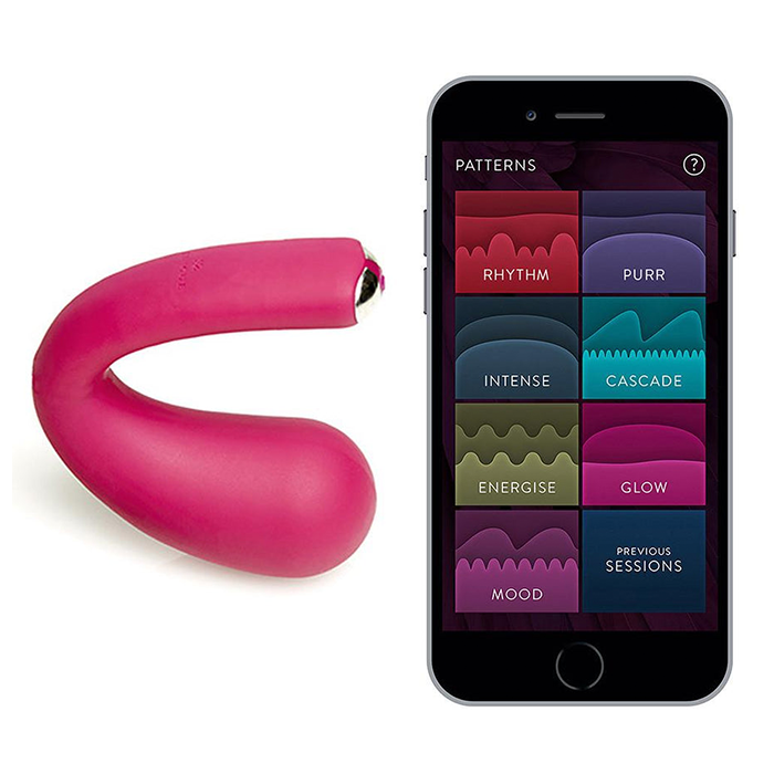 A pink curved vibrator next to a smartphone displaying app-controlled patterns.