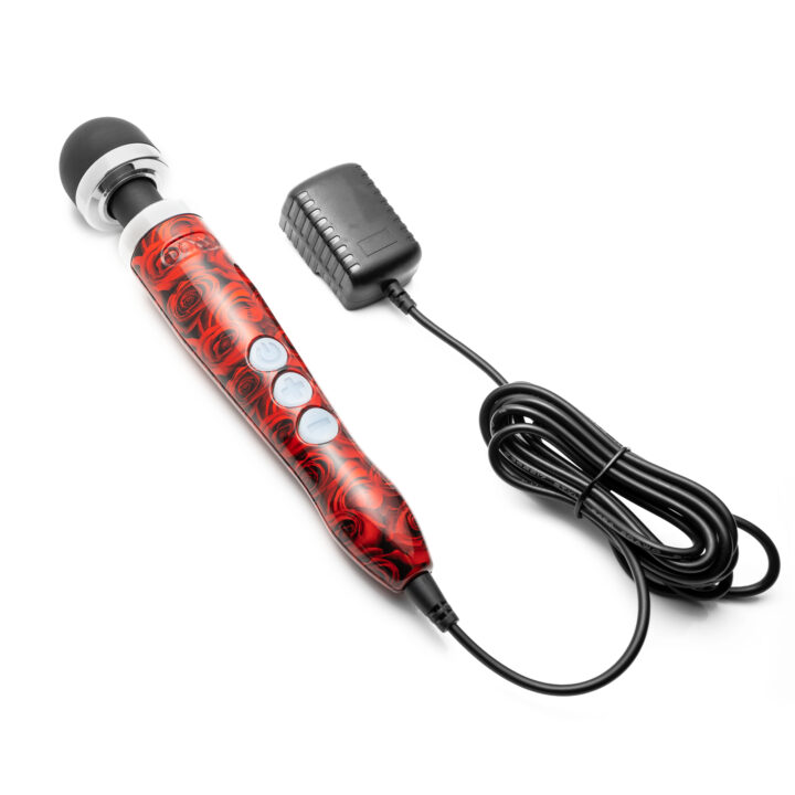 Compact wand massager with rose pattern and charging cable.