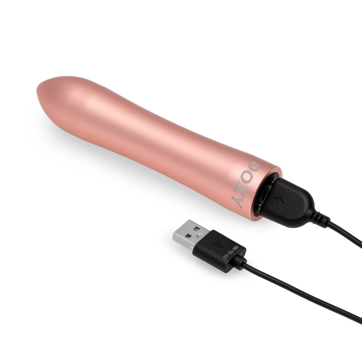 Rose gold Doxy bullet vibrator with USB charging cable.