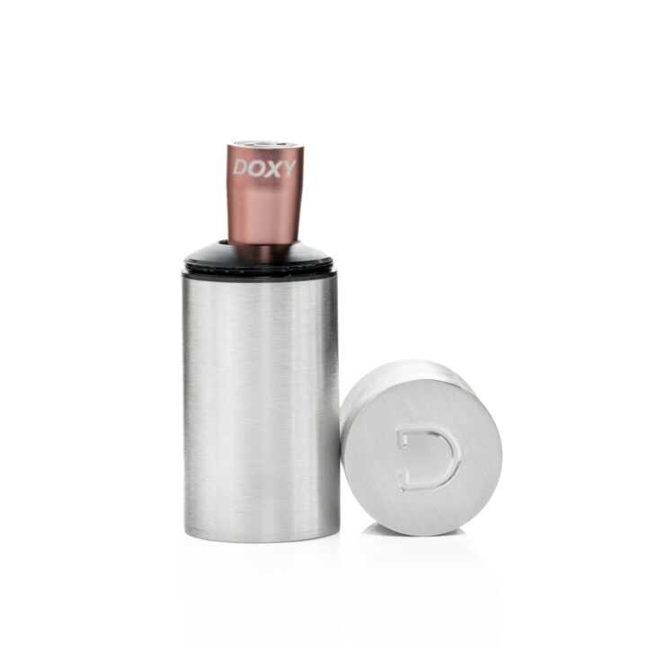 Rose gold and silver Doxy bullet vibrator with a detached cap.
