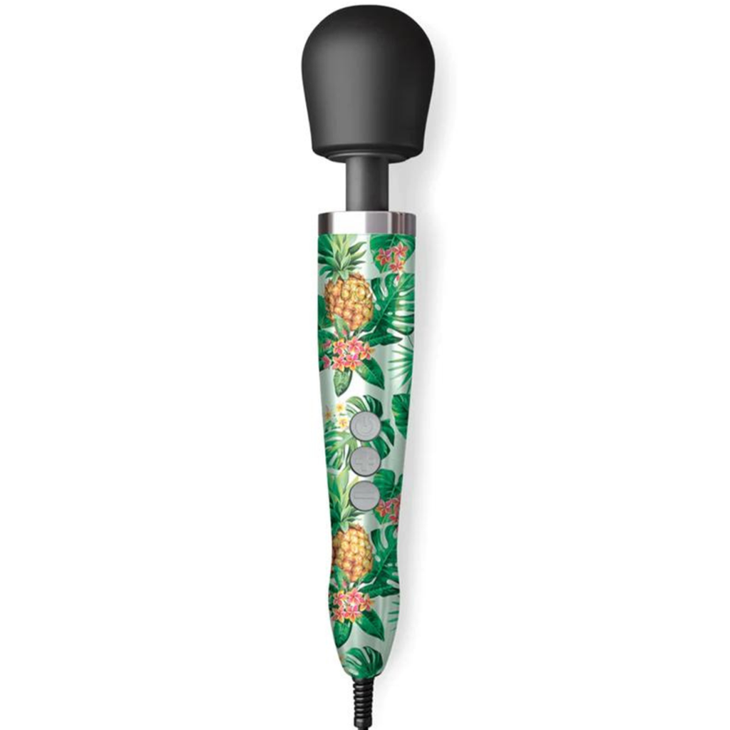 A wand massager with a black head and a tropical pineapple and leaf pattern on the handle.