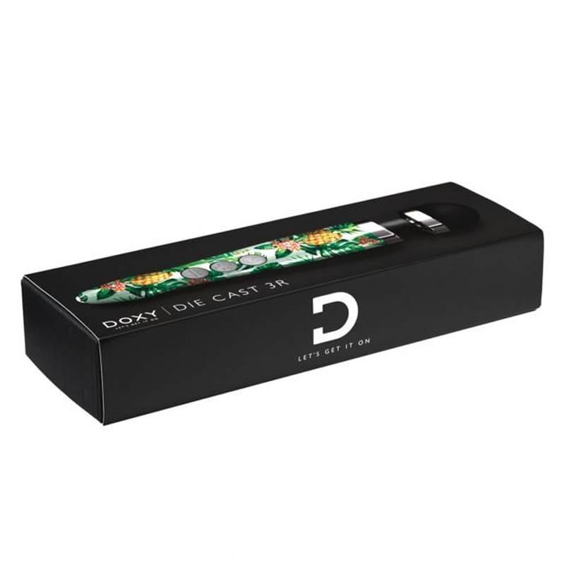 Doxy Die Cast 3R rechargeable wand massager with a pineapple design in its box.