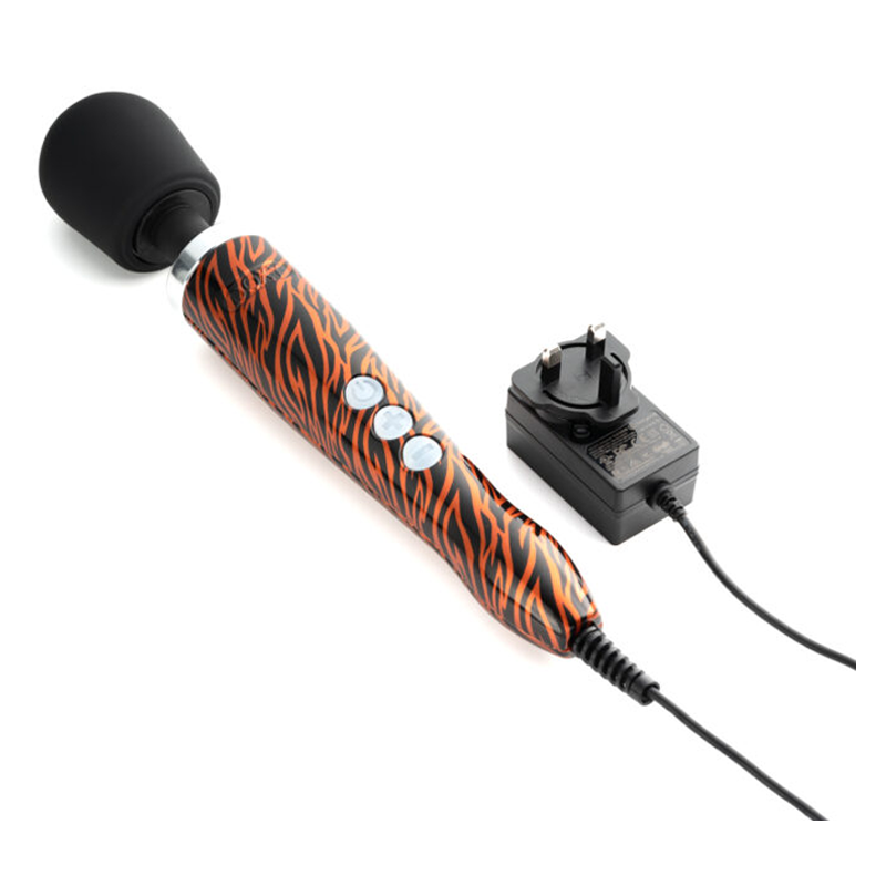 A tiger print wand massager with a black head and a power adapter.