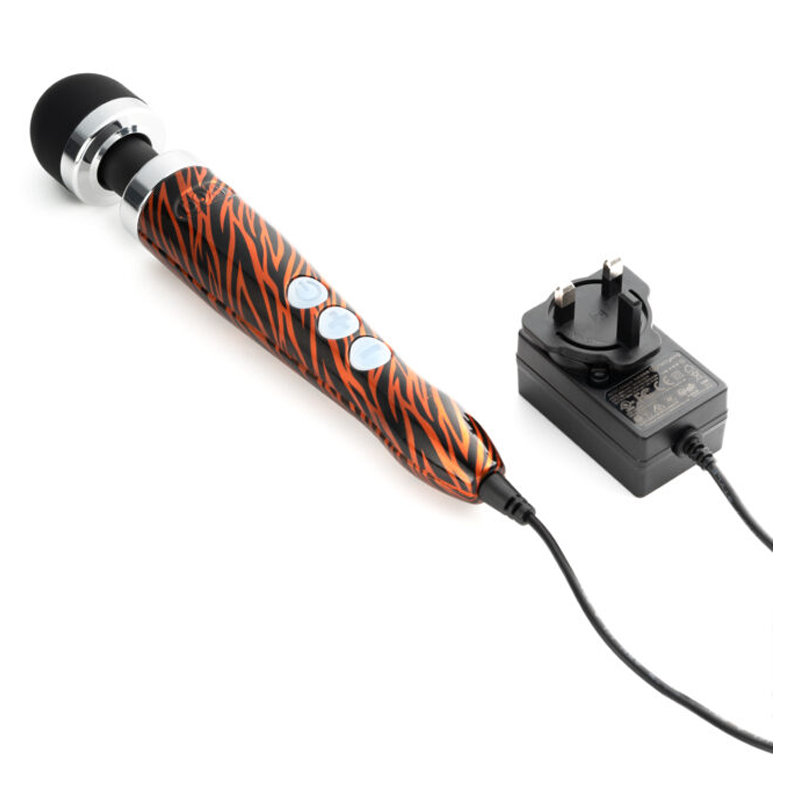 Compact wand massager with tiger print and silicone head, connected to a power adapter.