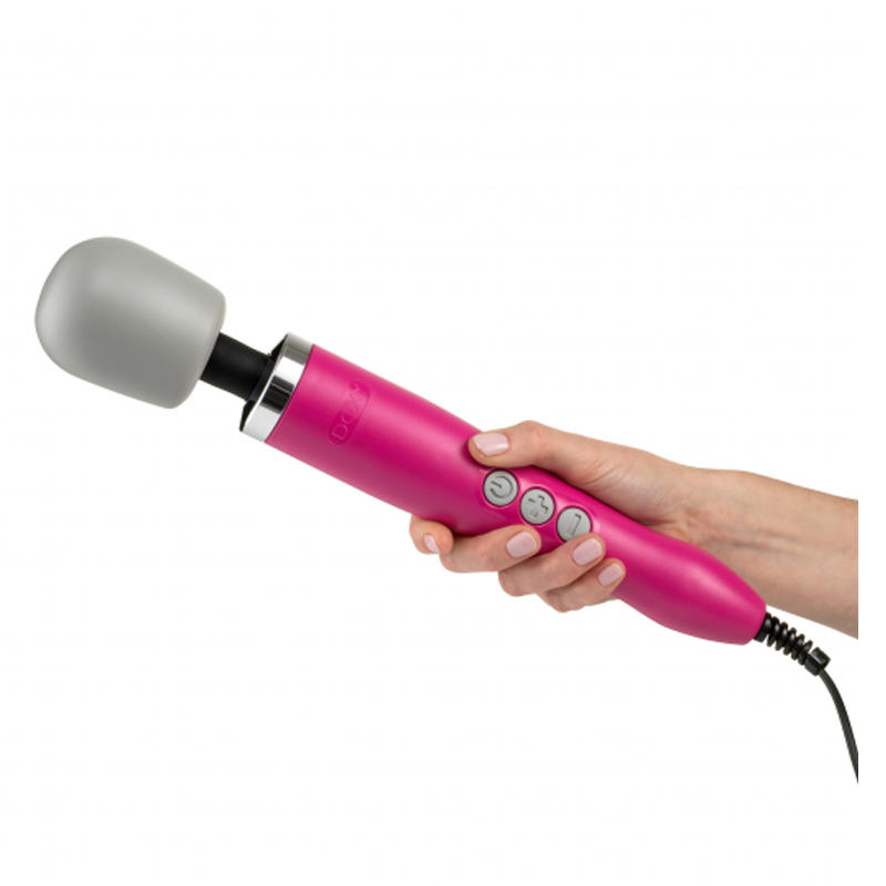 Pink Doxy wand massager with a grey silicone head held by a hand.