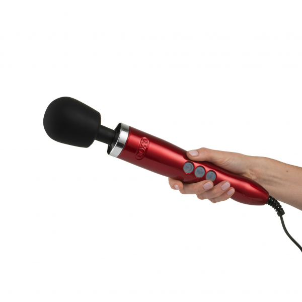 A red Doxy wand massager with a black head held in a hand.