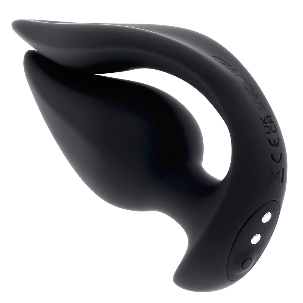Black silicone dual motor plug with two buttons and embossed text.