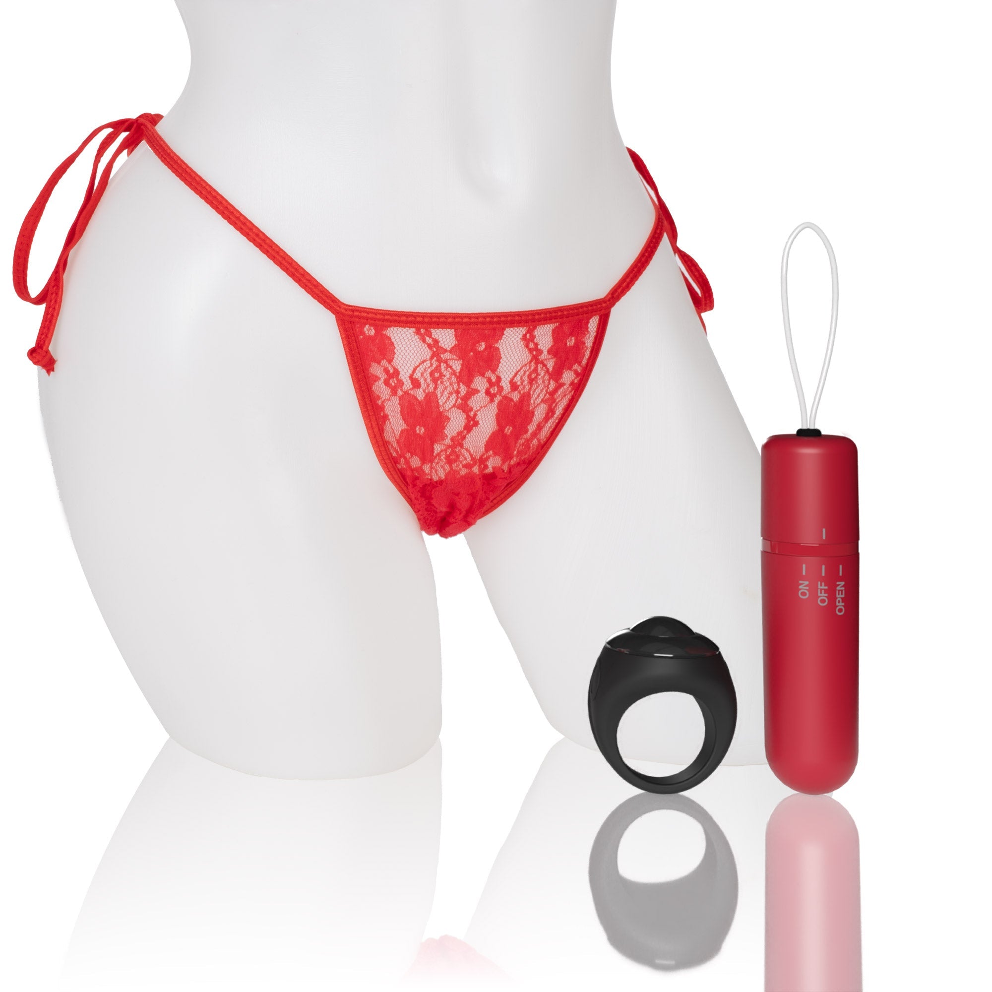 Red lace thong with a remote-controlled vibrator and a ring.