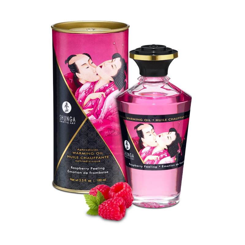 Raspberry edible warming massage oil with a kissing couple design.