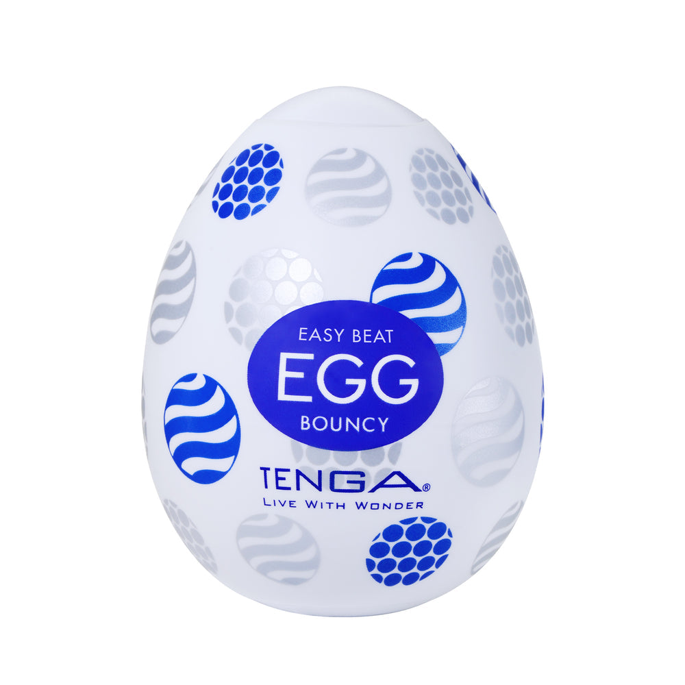White egg-shaped masturbator with blue and silver patterns and text.