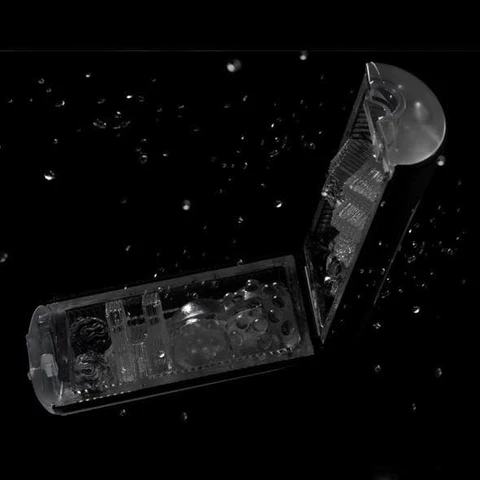 Tenga Black Edition Flip Hole masturbator with intricate textures and a clear case.