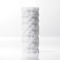 White textured cylindrical masturbator with a block pattern.