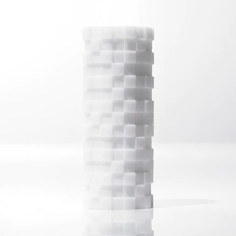 White textured cylindrical masturbator with a block pattern.