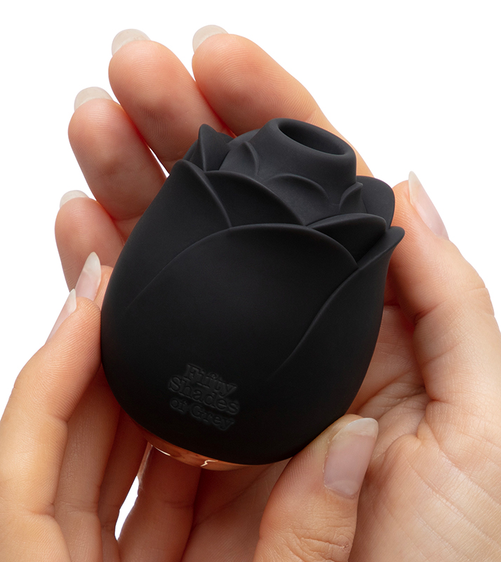 Black Rose rechargeable clitoral vibrator with Fifty Shades of Grey logo.