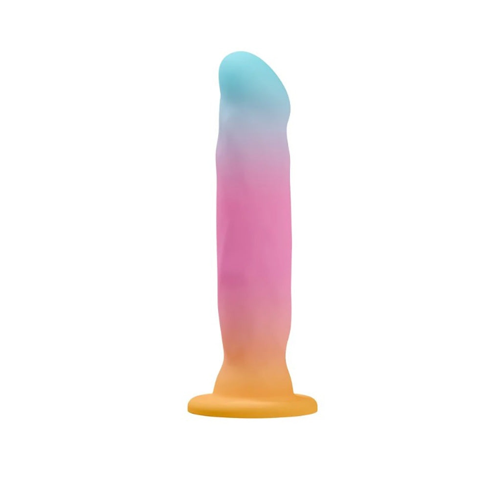 A silicone stimulator with a gradient of blue, pink, and orange, and a flared base.