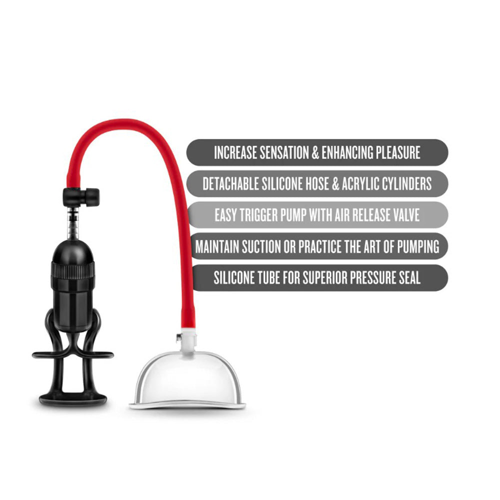 Pussy pump system with red hose, black pump, and clear cup.