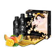 Shunga Oriental Body-to-Body Massage Gel with waterproof sheet and fruit.