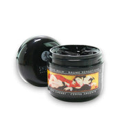 Shunga Blazing Cherry desensitizing balm in a black jar with a decorative label.