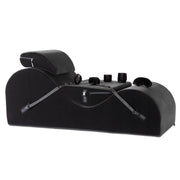Black positioning pillow with cuff kit and eye mask.