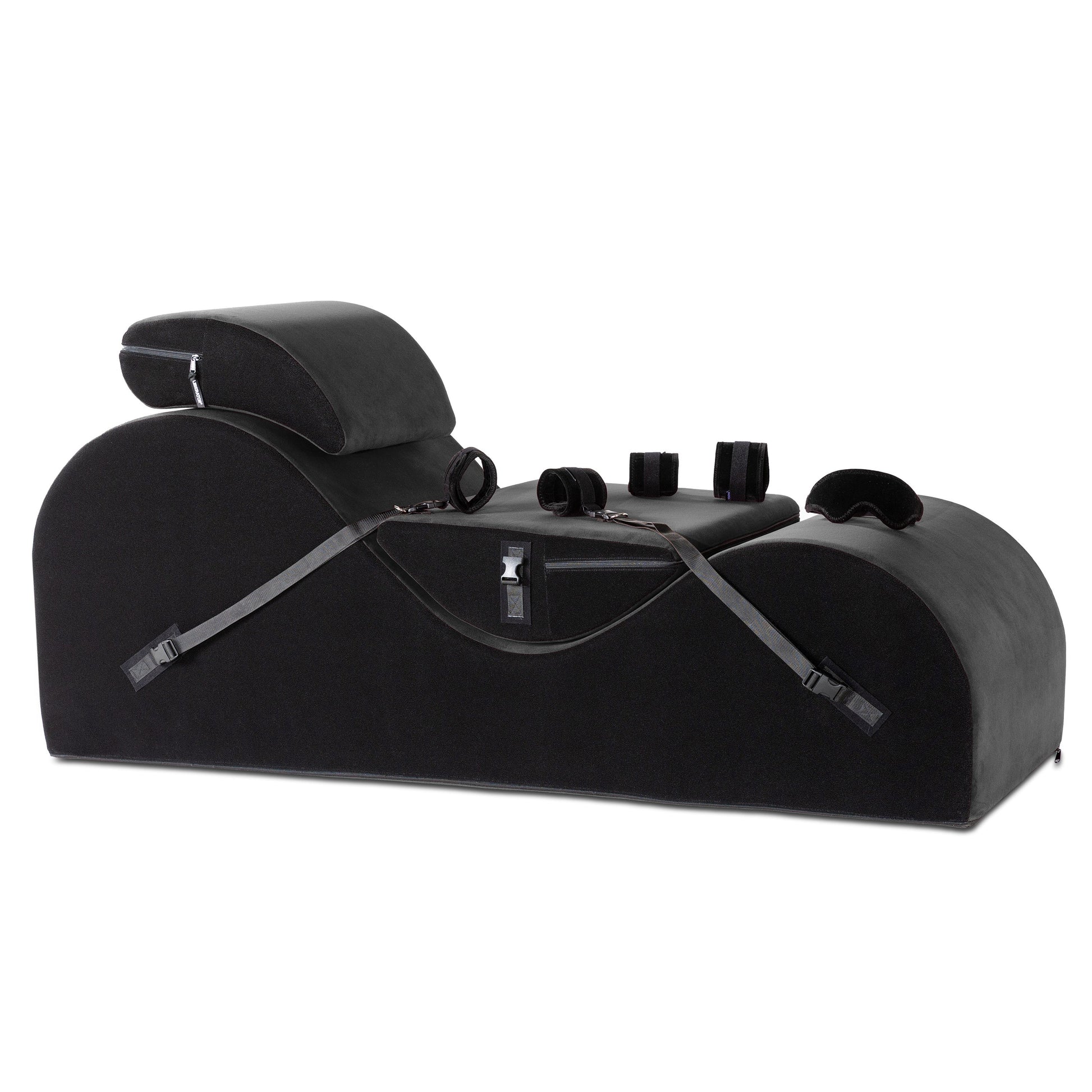 Black positioning pillow with cuff kit and eye mask.