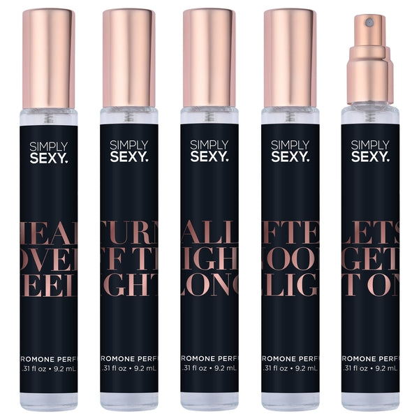 Five bottles of Simply Sexy pheromone perfume spray with rose gold caps.