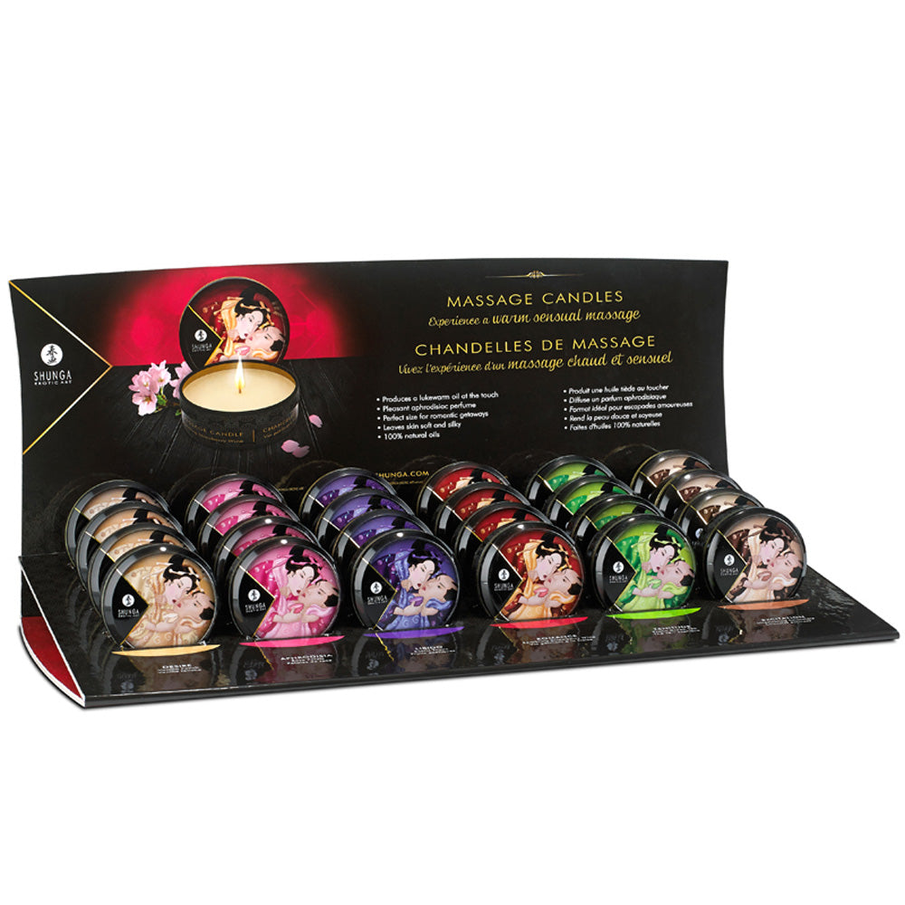 Display of 24 Shunga massage candles in various colors.