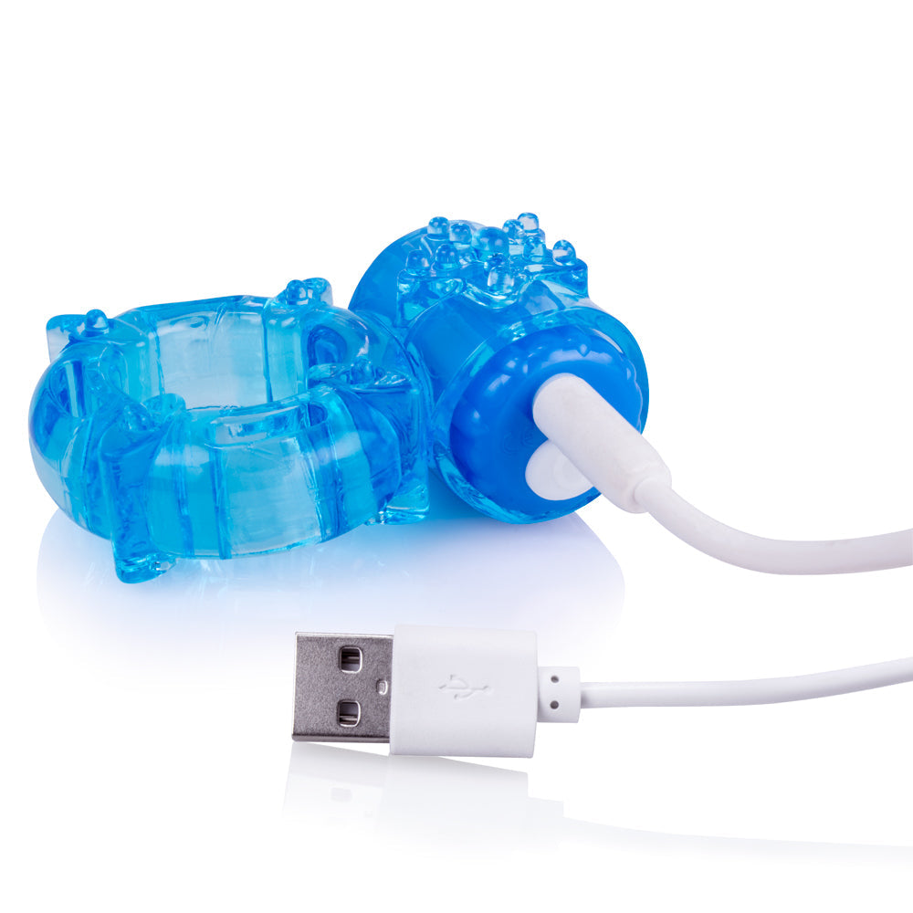 Blue rechargeable vibrating cock ring with USB cable.