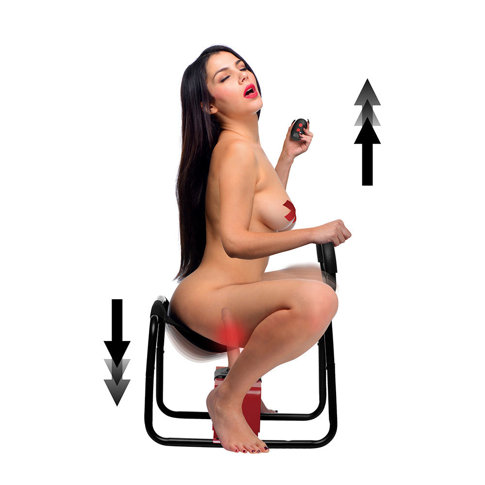 A nude woman sits on a black vibrating thrusting dildo bench with remote control and adjustment arrows.