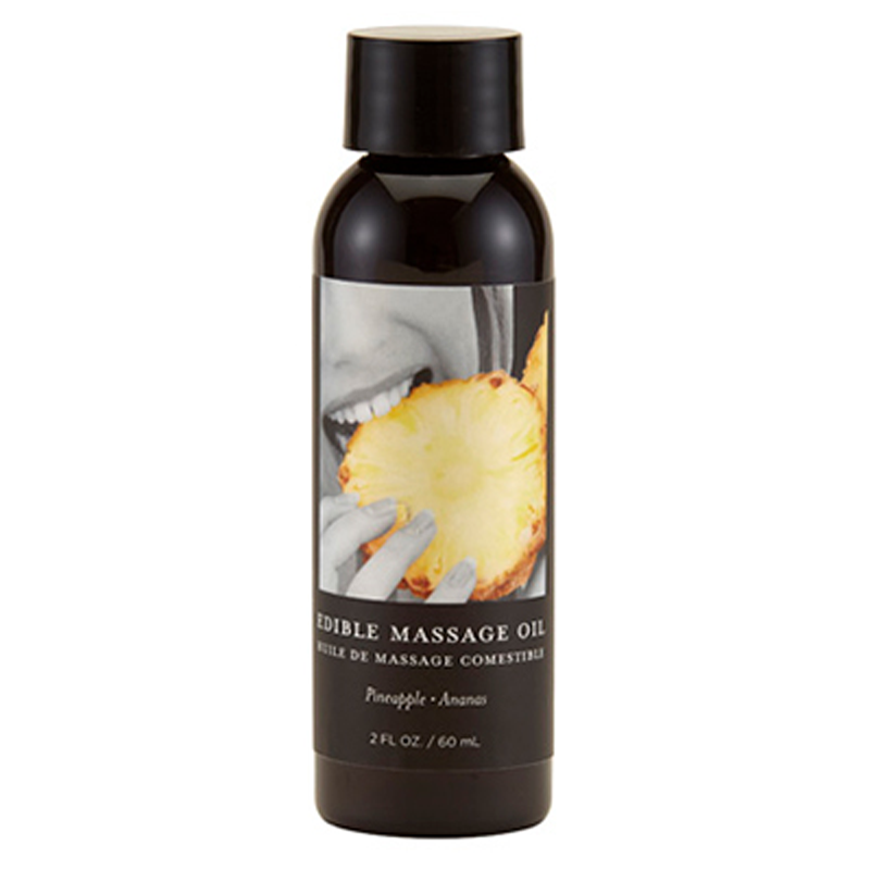Pineapple edible massage oil in a dark bottle with a black cap.