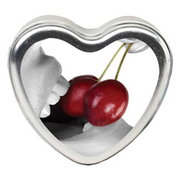 Heart-shaped edible massage candle with cherries.