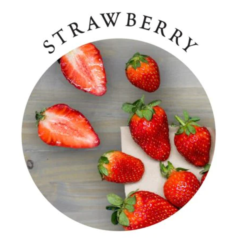 Several whole and halved strawberries are arranged on a wooden surface.
