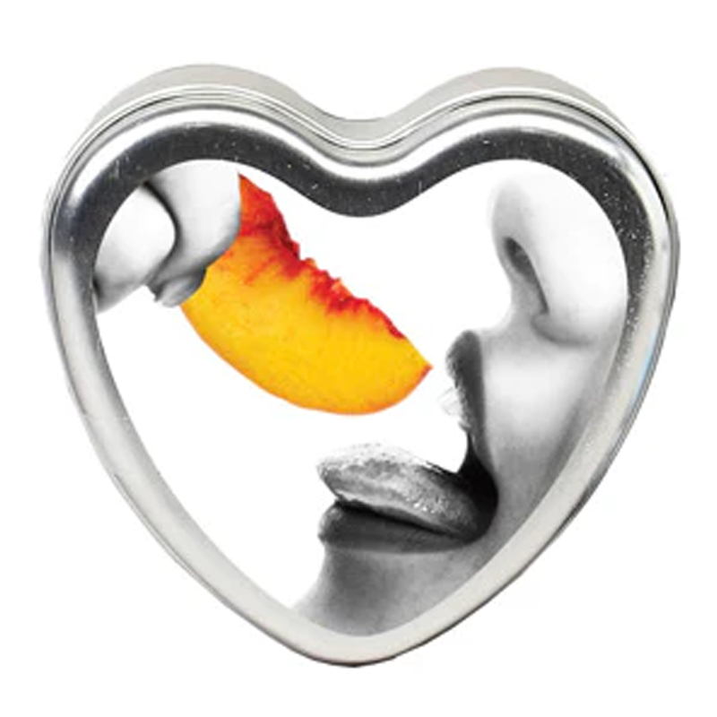 Heart-shaped tin with a slice of peach and a person's mouth and tongue.