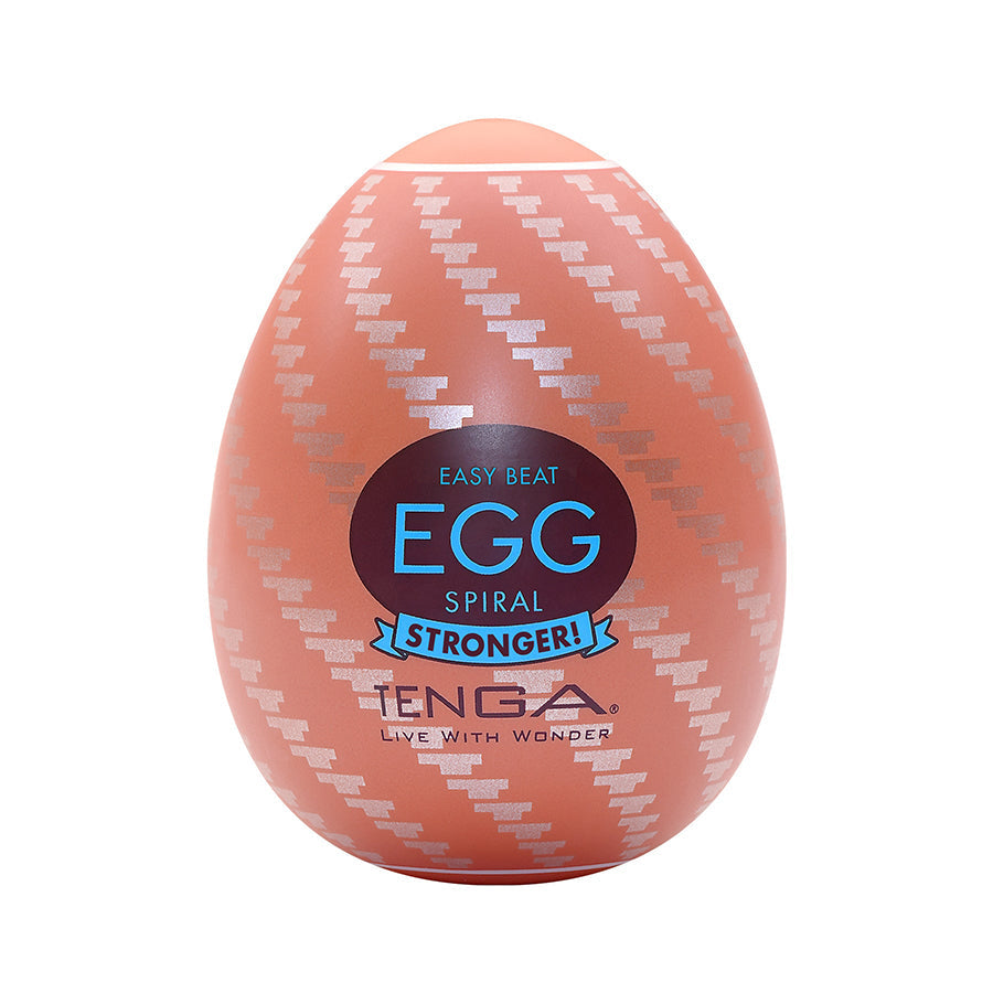 Tenga Spiral Egg male masturbator with a textured orange exterior.