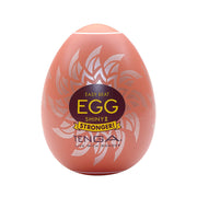 Tenga Shiny II male masturbator egg with a sun-shaped design.