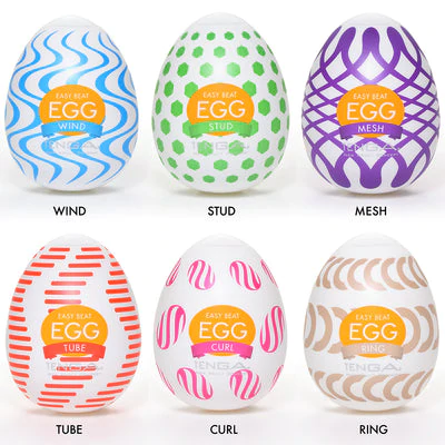 Six Tenga EGG masturbators with different textures and colors.