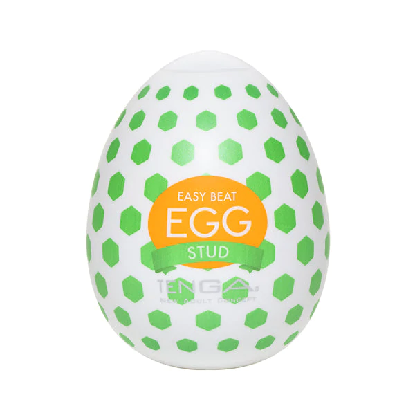 Tenga EGG Stud textured male masturbator with green hexagonal pattern.