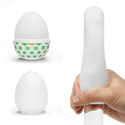 Tenga EGG Stud textured male masturbator in white with green polka dots.