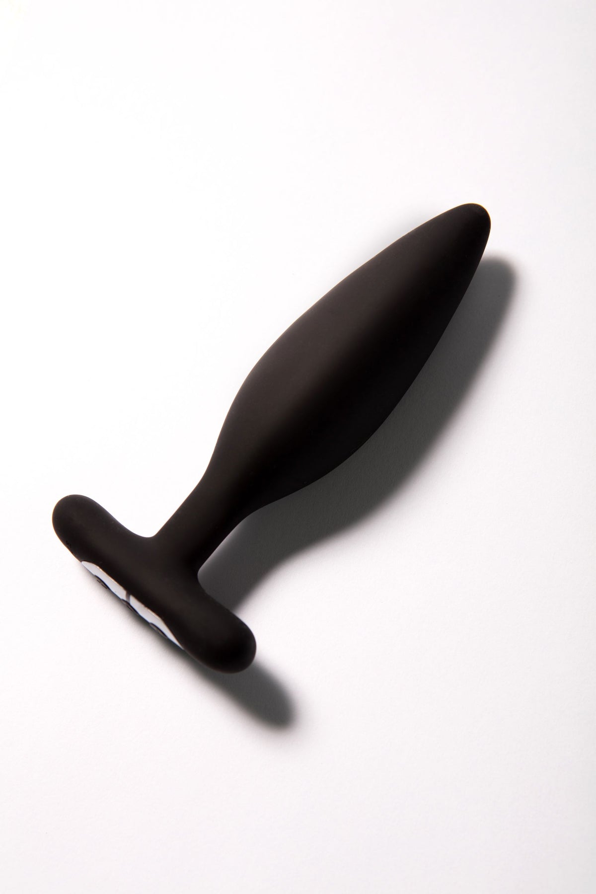 Black silicone vibrating anal plug with a T-shaped base.